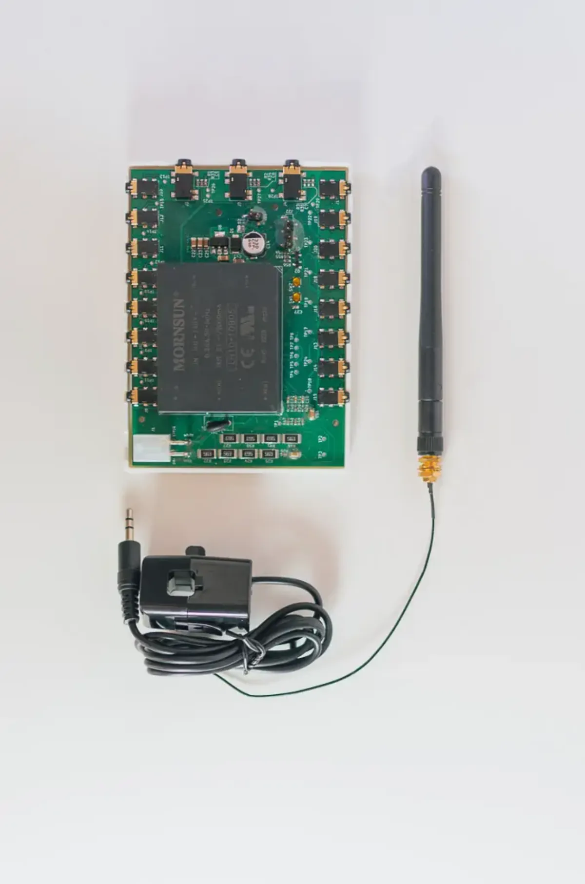 12-channel energy monitor board with antenna and a current clamp
